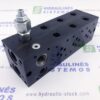 Hydraulic manifold NG6x3 ES0621-38-03 vith relief valve and place for 2/2 valve